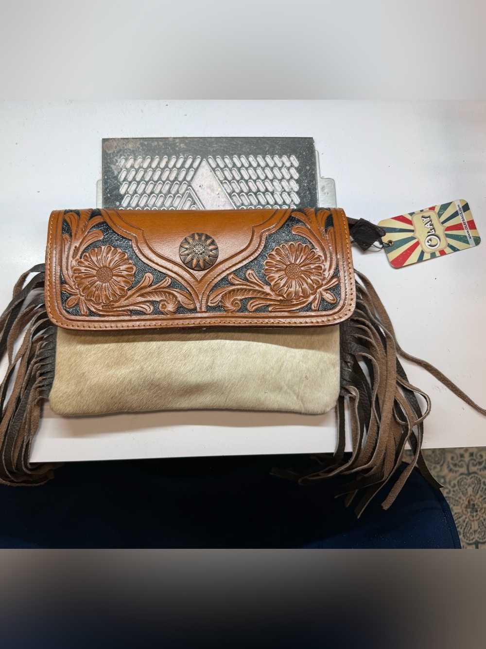 OLAY Tooled Leather & Hair-On Hide Crossbody in Tan and Cream with Fringe